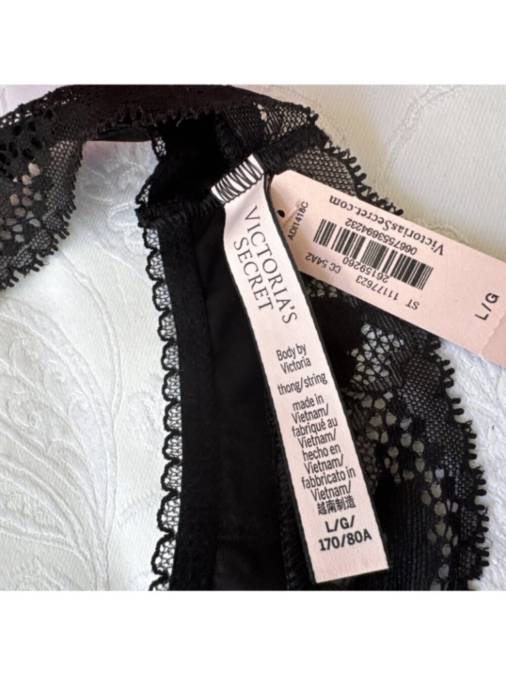 VICTORIA'S SECRET L BODY BY VICTORIA BLACK SILKY GOLD CHARM THONG PANTIES NWT - Picture 5 of 7